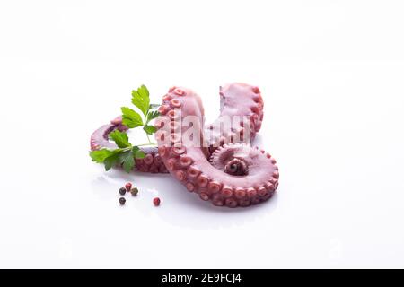 tentacles of stew octopus isolated on white background. Stock Photo