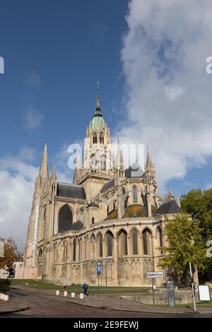 Bayeux France 10.18.2019 exterior of cathedral rising up a low angle to blue sky Stock Photo