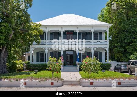 Beautiful old wooden house in spanish colonial style with a porch. Wooden district of Key West, Florida. Stock Photo