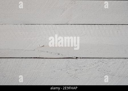 A photograph of decorative rough wood wall boards painted white Stock Photo