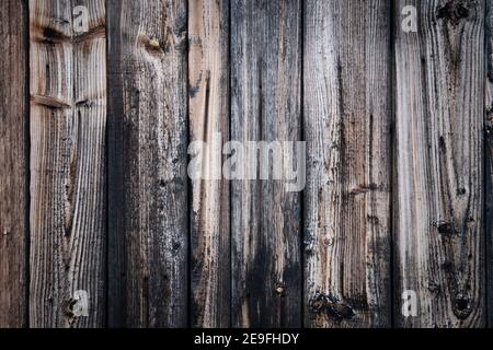 The weathered exterior of a natural finish shed wall Stock Photo