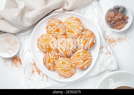Dessert with lemon cookies and lollipops on a white background. Stock Photo