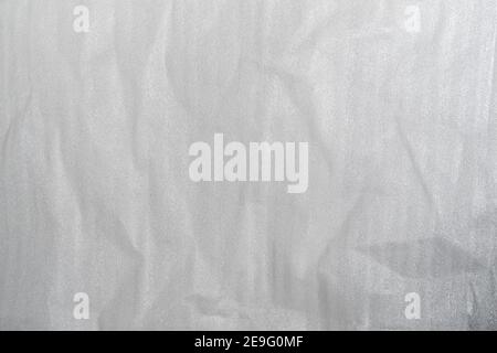 Crumpled white plastic foam foil texture perfect for background structure. Packaging material with rough wrinkles. Grunge textured surface Stock Photo