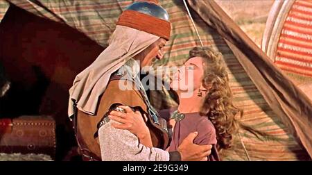 THE CONQUEROR 1956 RKO Radio Pictures film with John Wayne and Susan Hayward Stock Photo