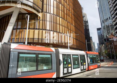 Sydney city centre summers day CBD light rail train tram on George Street passing the EY centre building,Sydney,Australia Stock Photo