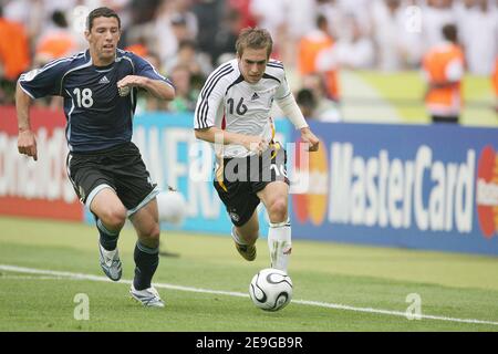 Argentina's Maxi Rodriguez and Germany's Philipp Lahm battle for the ball during the FIFA World Cup 2006, quarter final, Germany vs Argentina, in Berlin, Germany, on June 30, 2006. The game ended in draw 1-1 and Germany won (4-2) in a penalty-kick shootout. Photo by Gouhier-Hahn-Orban/Cameleon/ABACAPRESS.COM Stock Photo