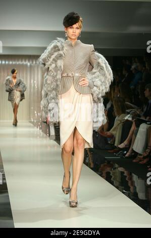 A model displays a creation by Italian fashion designer Giorgio Armani for his Haute-Couture Fall-Winter 2006-2007 in Paris, France, on July 05, 2006. Photo by Java/ABACAPRESS.COM Stock Photo