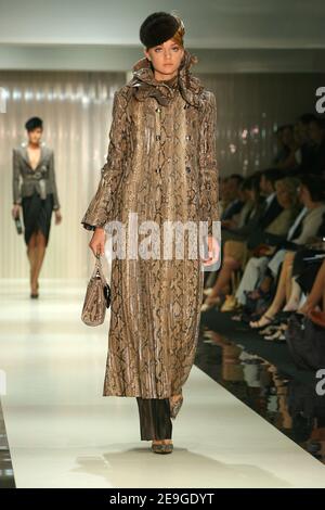 A model displays a creation by Italian fashion designer Giorgio Armani for his Haute-Couture Fall-Winter 2006-2007 in Paris, France, on July 05, 2006. Photo by Java/ABACAPRESS.COM Stock Photo