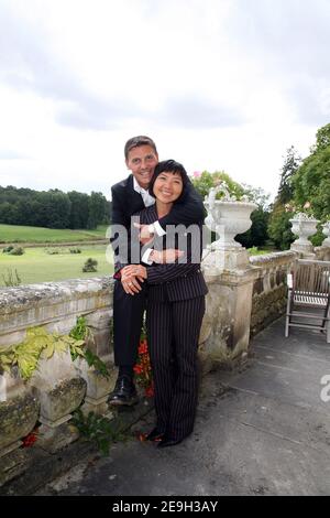 EXCLUSIVE : French President Jacques Chirac's adoptive daughter, Anh Dao Traxel and her husband Emmanuel Traxel pose during the 'Foret des Livres' writers meeting at Chanceaux Pres Loches, France, organized by French author Gonzague Saint-Bris on August 27, 2006 Photo by Denis Guignebourg/ABACAPRESS.COM Stock Photo