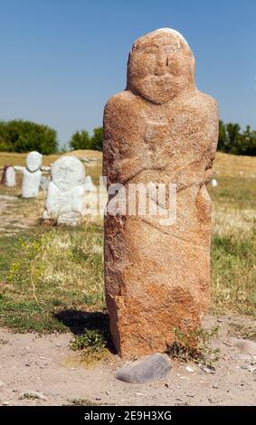 historic stone statue sculpture near Burana Tower in the Chuy Valley at northern of the country's capital Bishkek, Kyrgyzstan Stock Photo