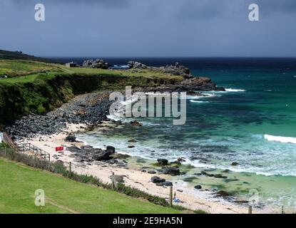 Rustic Porthmeor Beach With Turquoise Water At The Wild Atlantic Coast Of St Ives Cornwall England On A Sunny Summer Day With A Few Clouds In The Sky Stock Photo