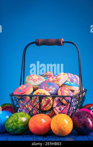 Homemade, freshly baked and decorated, colorful Easter cookies. Stock Photo