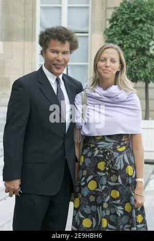 French TV presenter Igor Bogdanov and his wife Amelie de Bourbon de Parme attend a Legion d'Honneur giving ceremony held at the Elysee palace in Paris, France on september 8, 2006. Photo by Mousse/ABACAPRESS.COM Stock Photo