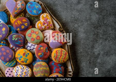Homemade, freshly baked and decorated, colorful Easter cookies. Stock Photo