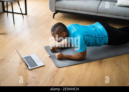 African American Doing Fitness Workout Exercise Class Stock Photo