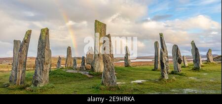 Isle of Lewis and Harris, Scotland: Rainbow and clearing sky at the Callanish Standing Stones Stock Photo