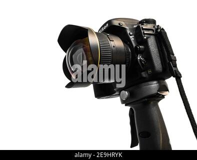 photo camera Nikon D800 + Nikkor lens 14mm standing on heavy tripod against the 255 white Stock Photo