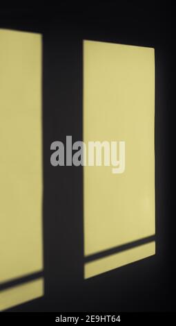 sunny light beams through window on concrete wall, the mobile wallpapers Stock Photo