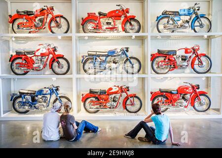 Birmingham Alabama,Barber Vintage Motorsports Museum,motorcycle collection,visitors couple looking, Stock Photo