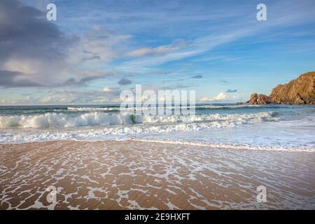 Isle of Lewis and Harris, Scotland: Waves breaking on the sands of Dail Mor (Dalmore) beach on the north side of Lewis Island Stock Photo