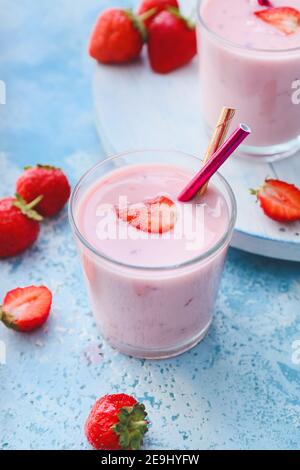 Homemade strawberry yogurt on color background Stock Photo - Alamy