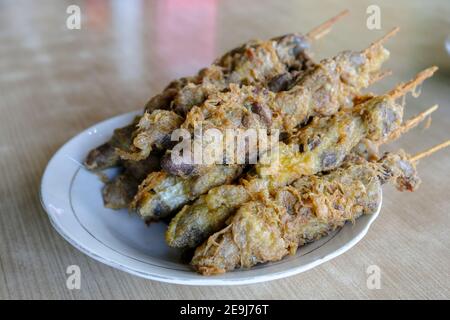 Sate Ati Ampela or chicken heart and gizzard satay, traditional satay from Indonesia for side dish. Stock Photo