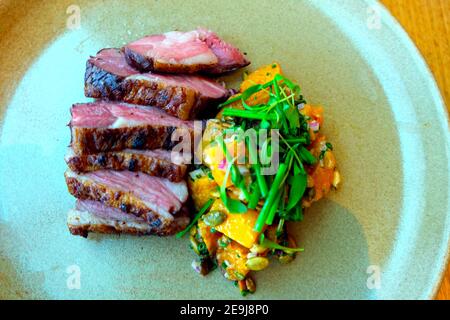 Roasted Lamb Rump with a side serve of pumpkin Stock Photo