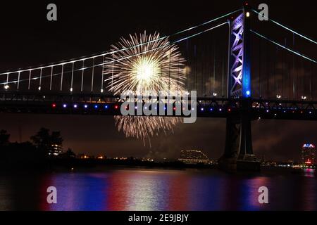 Fireworks Exploding Near Ben Franklin Bridge Philadelphia PA on July 4th. Stock Photo