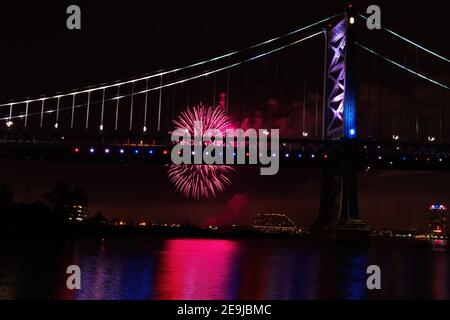 Fireworks Exploding Near Ben Franklin Bridge Philadelphia PA on July 4th. Stock Photo