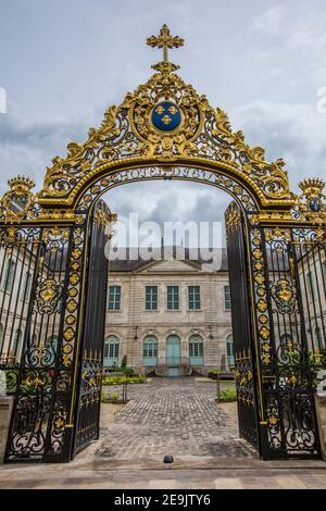 The ornate gates of the Hotel-Dieu-Lecomte (Town Hall) in the town of Troyes in the Grand Est region of northern France. Stock Photo