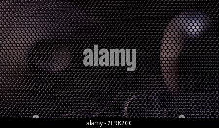 Black grille texture as a background. Stock Photo