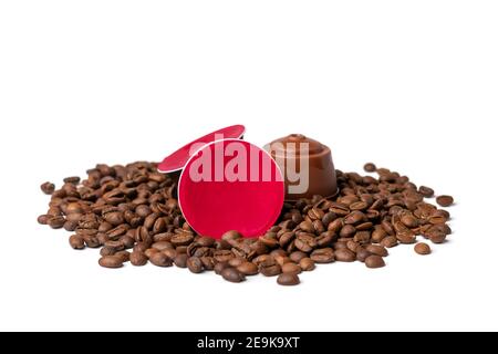 set of coffee capsules, roasted beans isolated on white background Top view Flat lay Drink obtained from dosed capsule with roasted, ground and Stock Photo