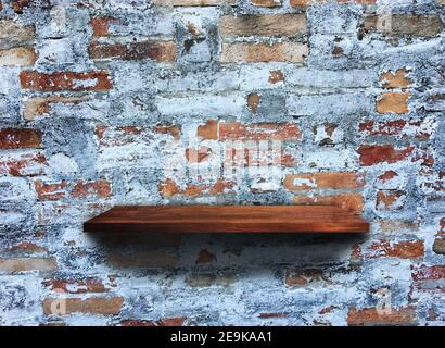 Rustic wooden shelf on grey concrete wall texture background with clipping path. pattern wallpaper Stock Photo