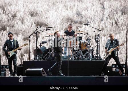 The Edge, Bono, Larry Mullen Jr and Adam Clayton of U2 perform Joshua Tree live on stage at Twickenham Stadium, Twickenham, London. Stock Photo