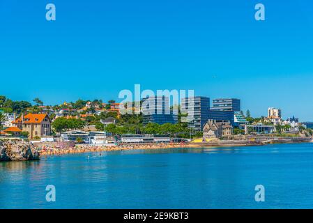 Palace of duques of palmela viewed behind Duquesa beach in Cascais, Portugal Stock Photo