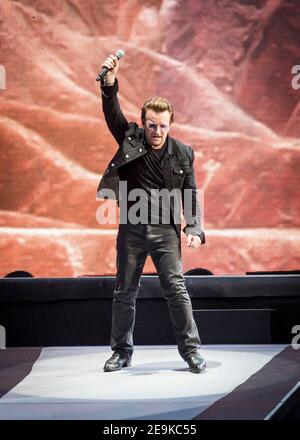 Bono from U2 performs Joshua Tree live on stage at Twickenham Stadium, Twickenham, London. Stock Photo