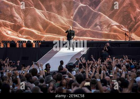 Bono from U2 performs Joshua Tree live on stage at Twickenham Stadium, Twickenham, London. Stock Photo