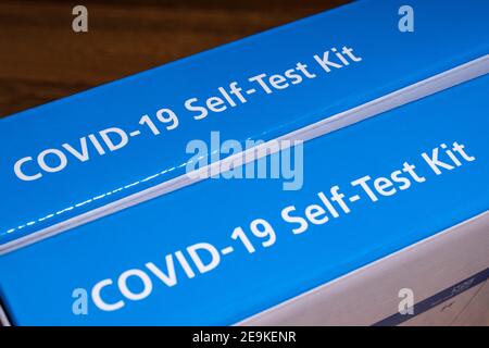 London, UK - January 29th 2021: Close-up of two COVID-19 Self-Test Kits, or Home Testing Kits, issued by the NHS. Stock Photo