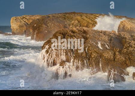 Swell and storm in the Hermitage of the Virgen del Mar in San Roman de la Llanilla in the Municipality of Santander. Virgen del Mar Island in the Cant Stock Photo