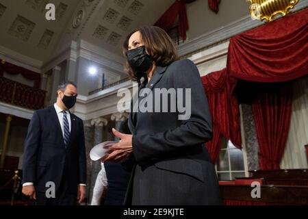 US Vice President Kamala Harris (R) walks past Democratic Senator from California Alex Padilla (Back L), after a ceremonial swearing-in photo opportunity in the Old Senate Chamber on Capitol Hill in Washington, DC, USA, 04 February 2021. (Photo by Pool/Sipa USA) Stock Photo