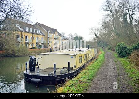 Canal boat in river during winter Stock Photo