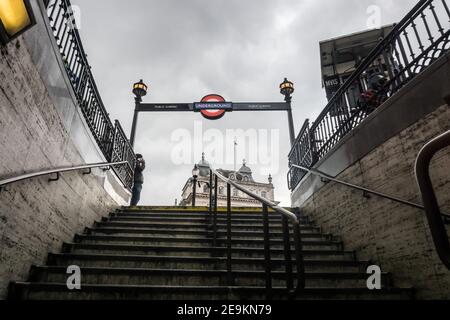 Looking up the steps out of Piccadilly Underground station in central London, England on a cloudy day Stock Photo