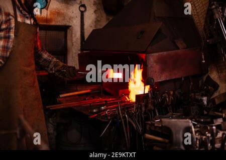 Fire of blacksmith in the blacksmith's workshop. Stock Photo