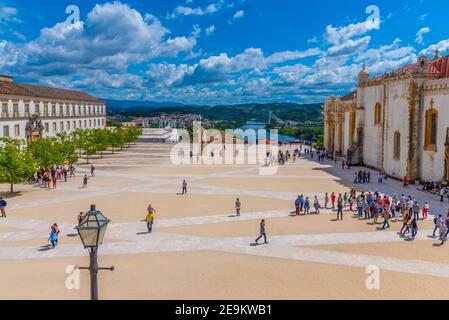 COIMBRA, PORTUGAL, MAY 21, 2019: People are strolling at the yard of the university of Coimbra in Portugal Stock Photo