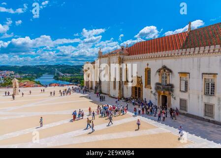 COIMBRA, PORTUGAL, MAY 21, 2019: People are strolling at the yard of the university of Coimbra in Portugal Stock Photo