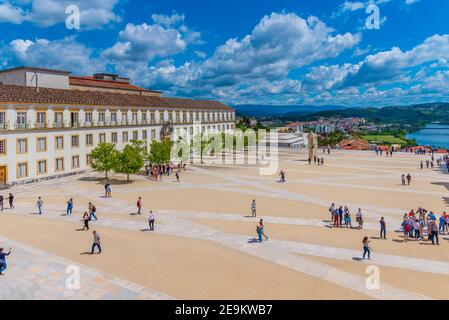 COIMBRA, PORTUGAL, MAY 21, 2019: People are strolling at the yard of the university of Coimbra in Portugal Stock Photo