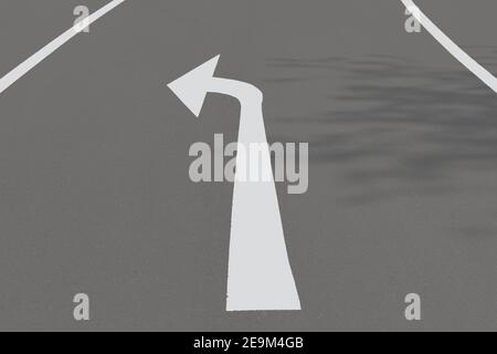 Road with turn left arrow Stock Photo