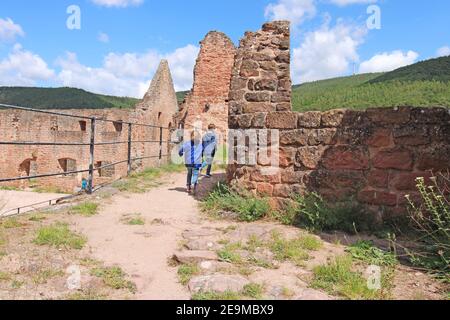 Boy and girl on a castle ruin in the Palatinate forest (Germany), Model released Stock Photo