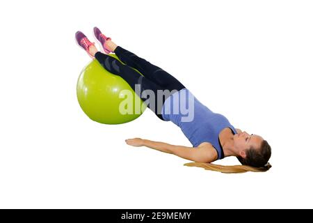 Woman doing exercises on exercise ball (white background), model released Stock Photo