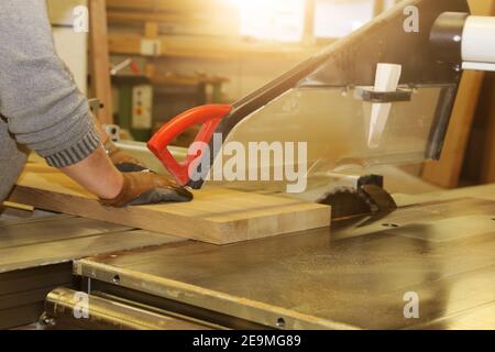Joiner at work in his carpentry workshop Stock Photo
